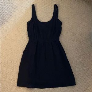 Black dress in grid texture